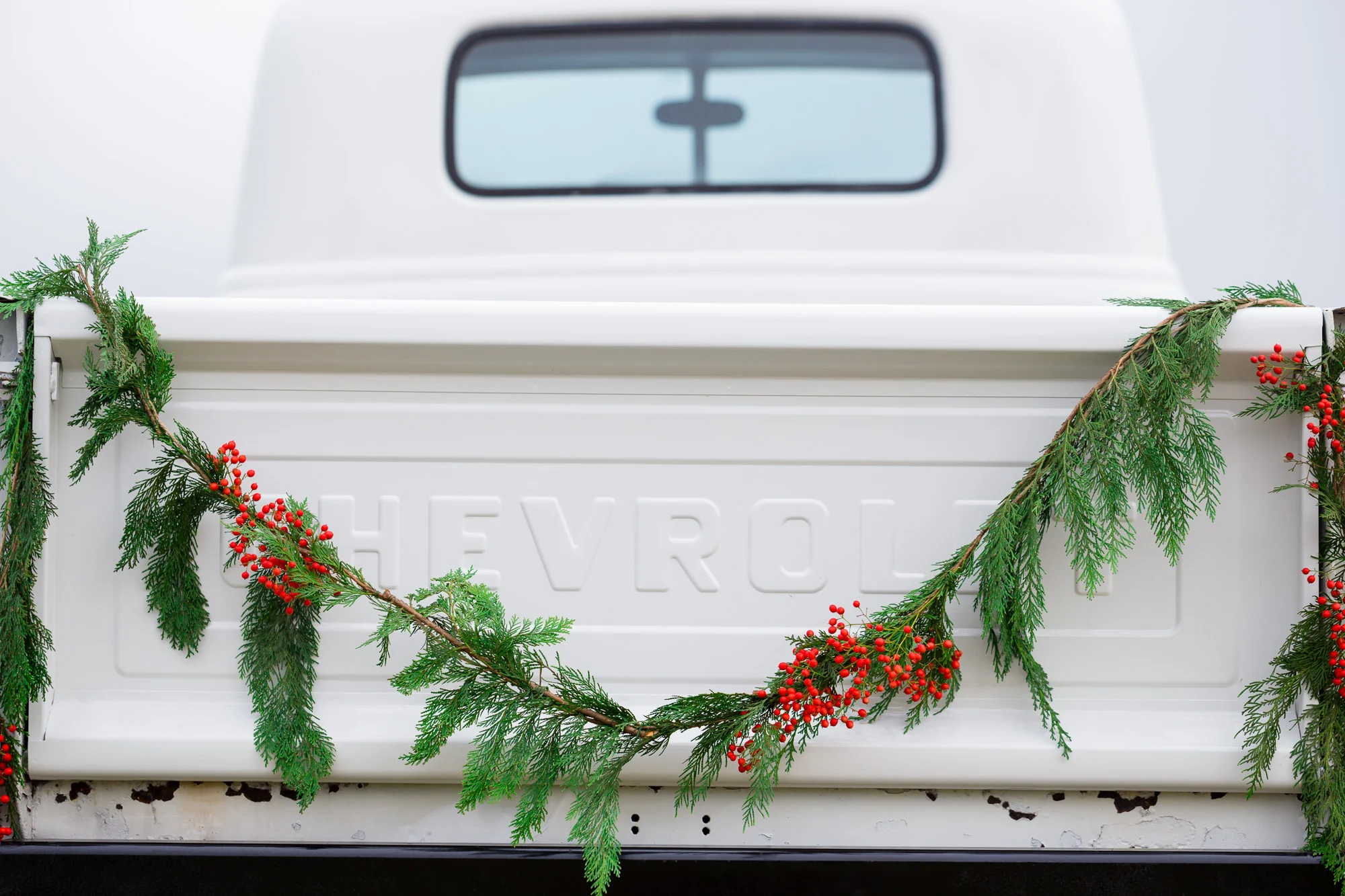 Vintage Chevy Truck Engagement Photos - Christmas Tree Farm Engagement Photos by Joshua Rainey Photography