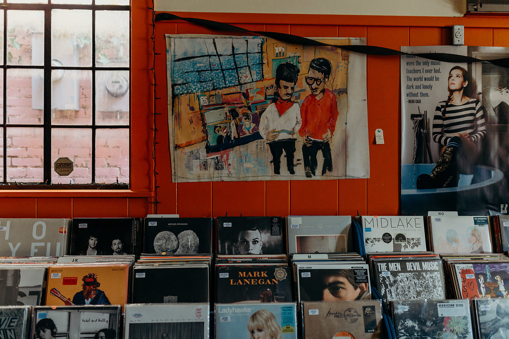 A 70's Inspired Record Shop Engagement -- Agape Photography -- Wedding Inspiration - The Overwhelmed Bride