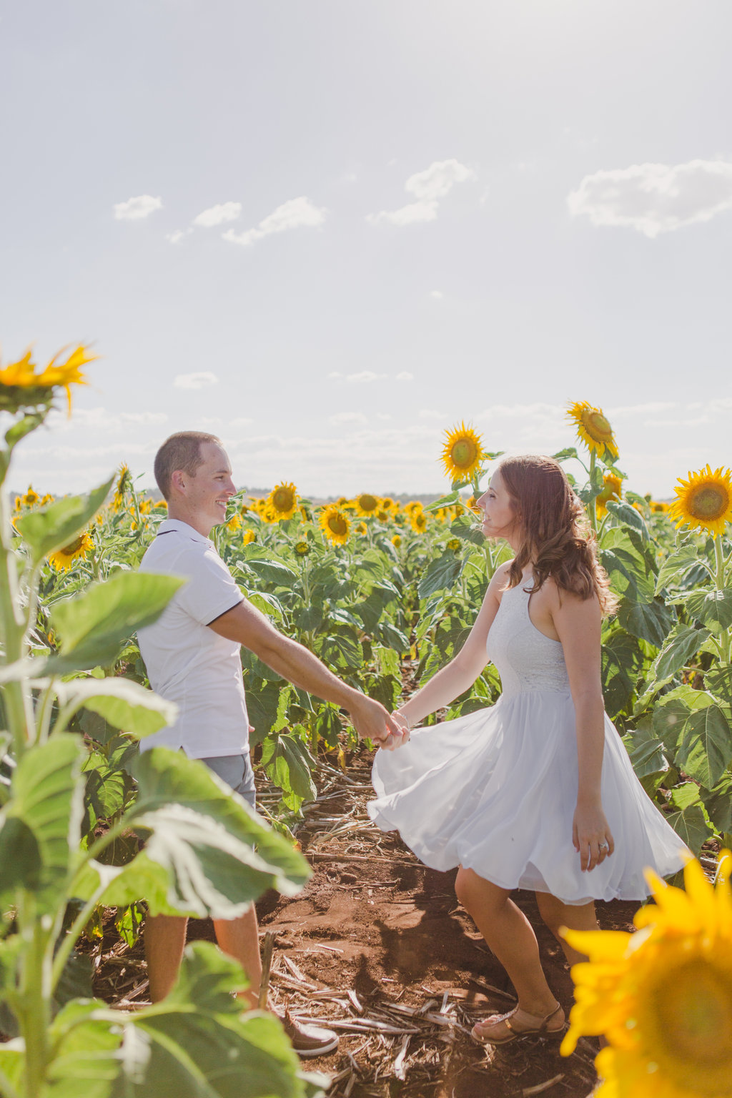 Sunflower Field Engagement Photos -- The Overwhelmed Bride Wedding Blog