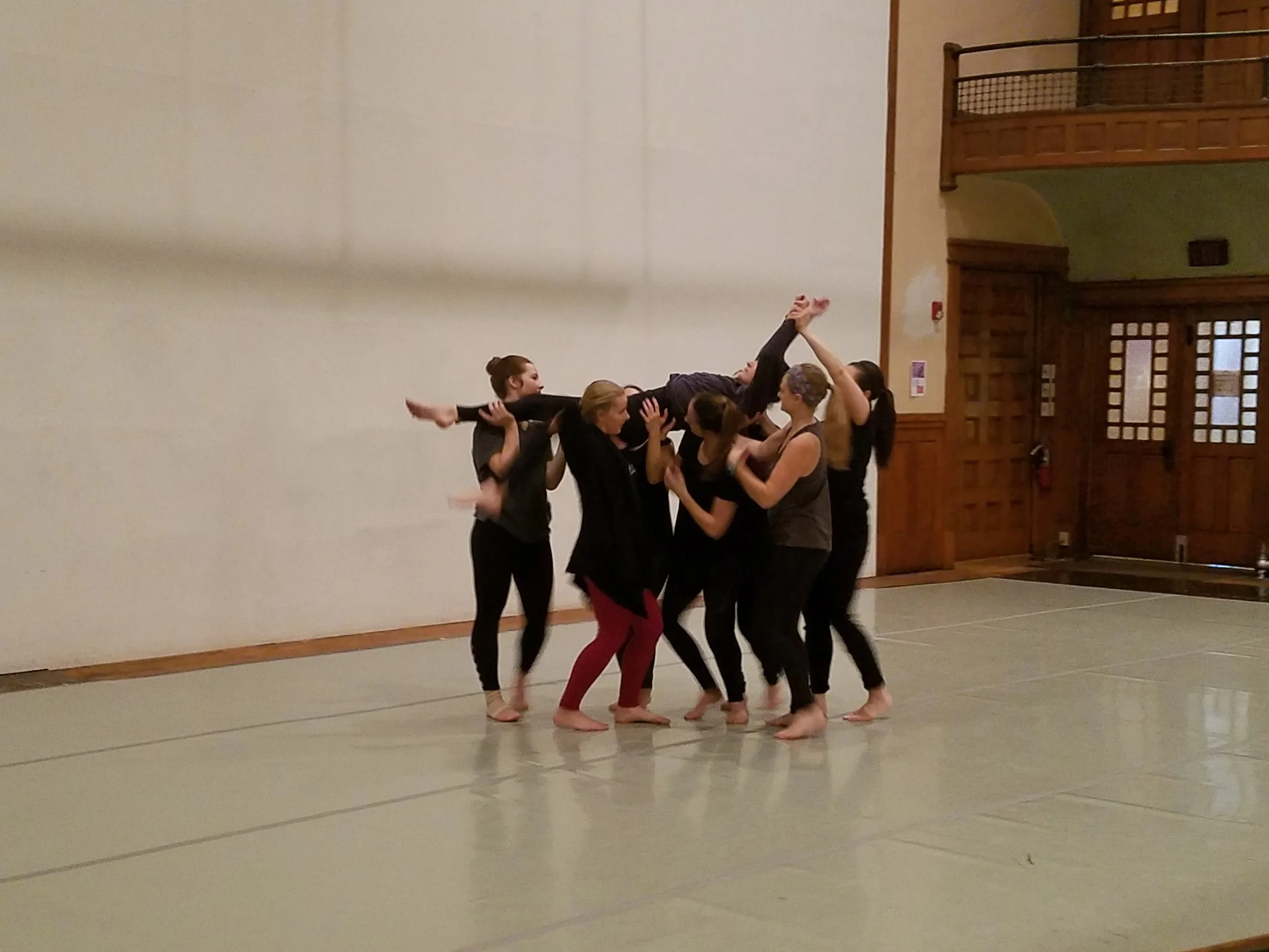 Intensive participants explore partnership, trust, and lifting in class.