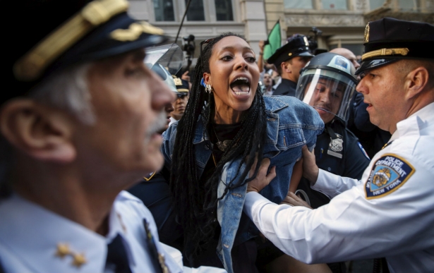 NYPD officers detain a protester during a march in solidarity with Baltimore on April 29, 2015. (Reuters/Mike Segar)