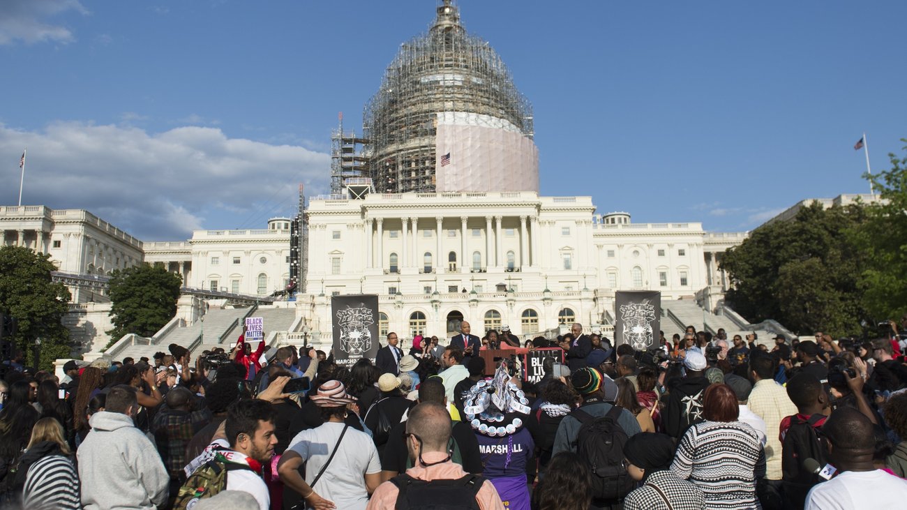 Demonstrators participated in a March2Justice for criminal justice reform legislation outside the Capitol in April. Lawmakers who are working to on fixes to the justice system say recent unrest is pushing them to act. Saul Loeb/AFP/Getty Images