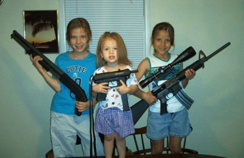 white kids posing with high-powered weapons.