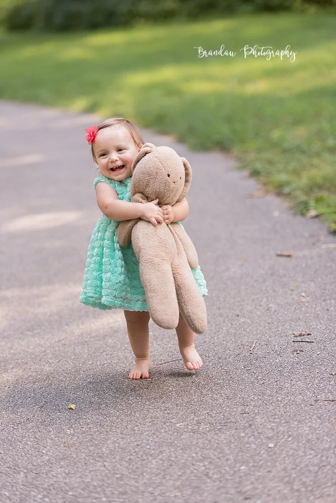 Brandau Photography - Girl smiling with bear.jpg