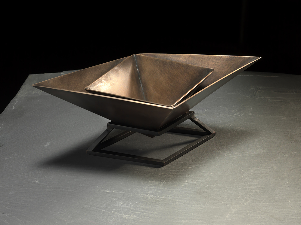  Funerary Vessel II Silicon bronze (vessel), blackened mild steel (stand) |&nbsp;8 1/2" x 4 1/2" x 7 1/2" |&nbsp;Inquire for price Photo by Christopher Eltrich 