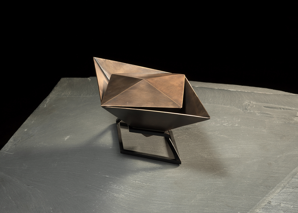  Funerary Vessel II Silicon bronze (vessel), blackened mild steel (stand) |&nbsp;8 1/2" x 4 1/2" x 7 1/2" |&nbsp;Inquire for price Photo by Christopher Eltrich 