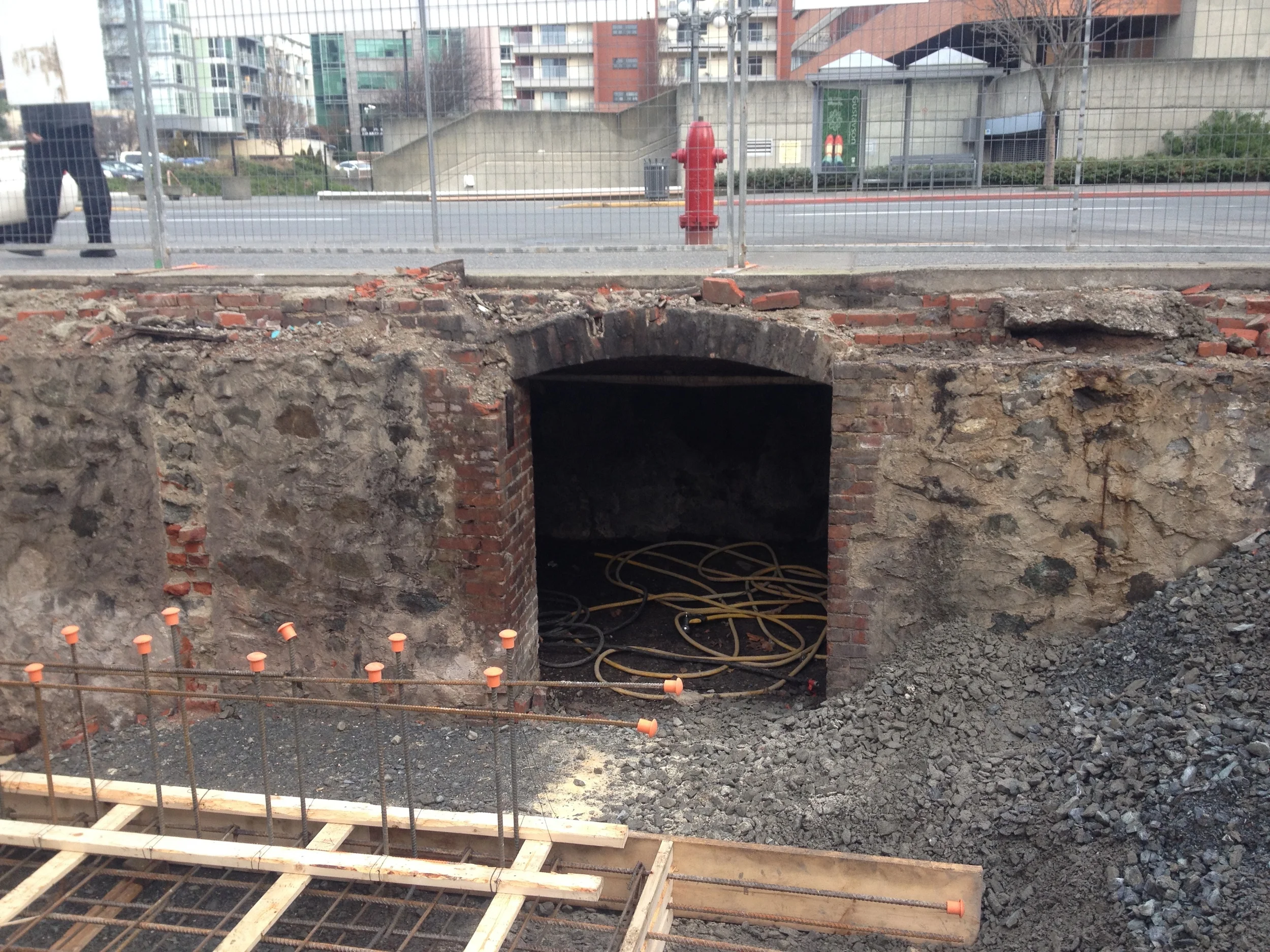 Below street level doorway.