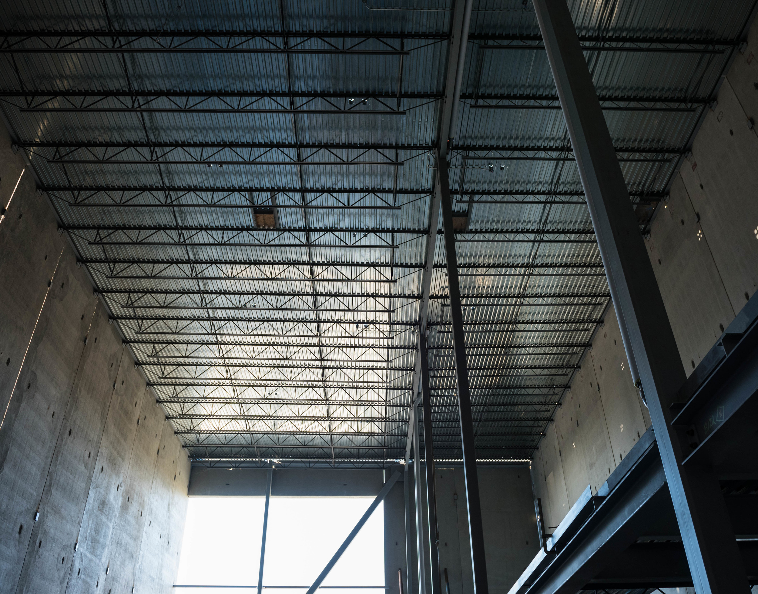 Looking up from back of the gym. Upper mezzanine on right has climbing as tall as the tallest lines in Crag X on John Street. 