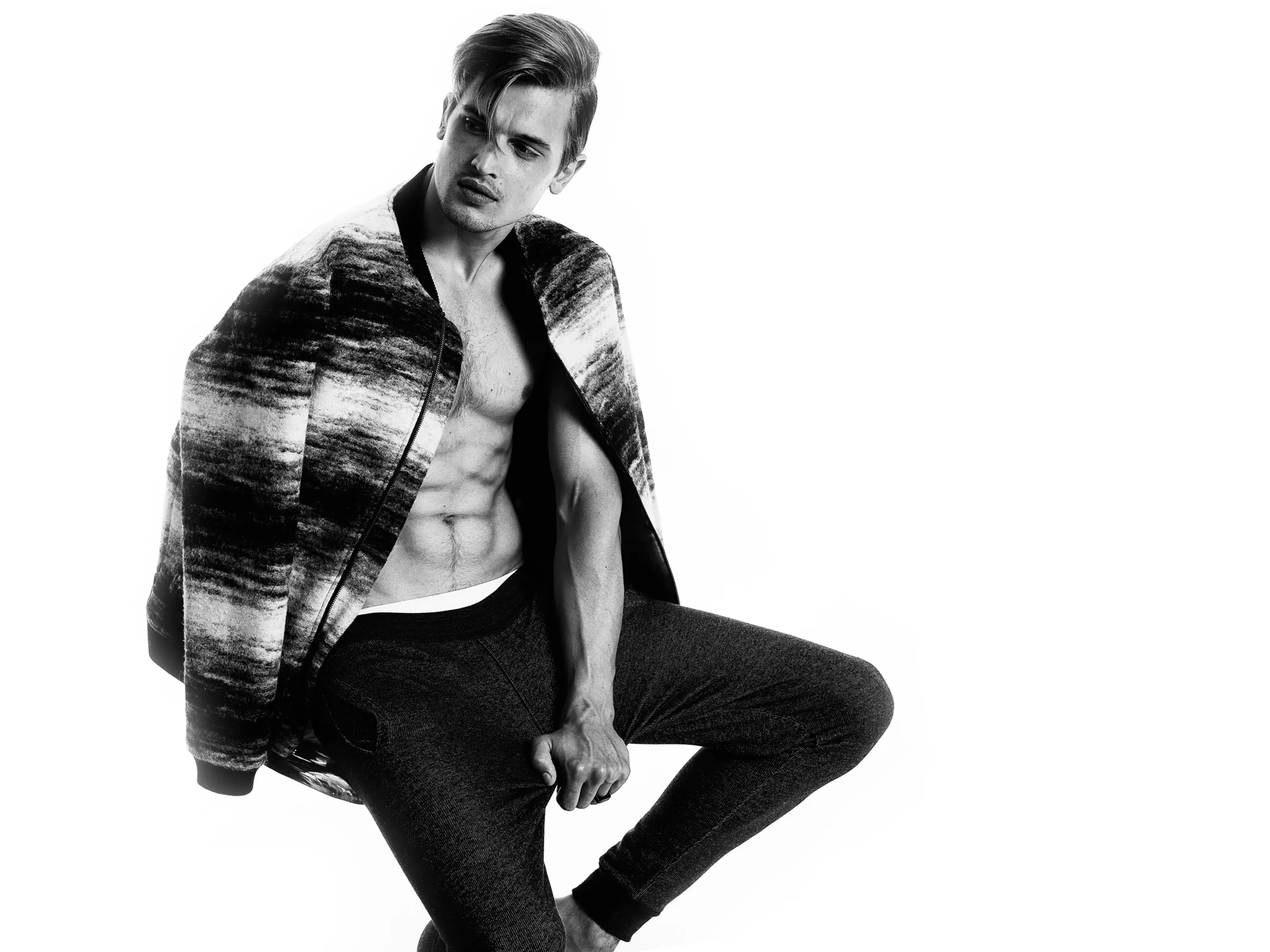 Briefs: Zeeman, Bomber jacket: Won Hundred, Joggers: Won Hundred, Ring: Icon Brand 