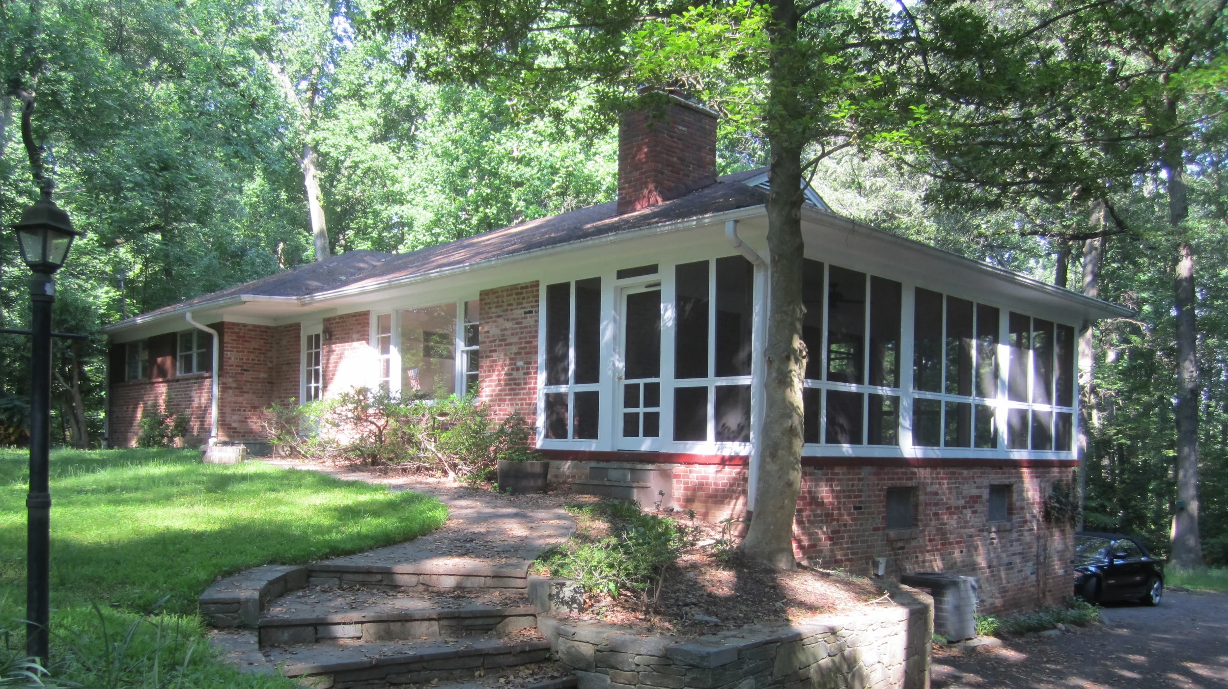  whole house renovation done on this 50's brick ranch in the woods. minimal changes to the floor plan were made, but all surfaces were updated as this house had sat untouched since it was built. 
