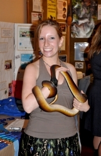 Emily holding Skeletor, a Cape Ann Vernal Pond Team star player (aka the White Lipped Python)