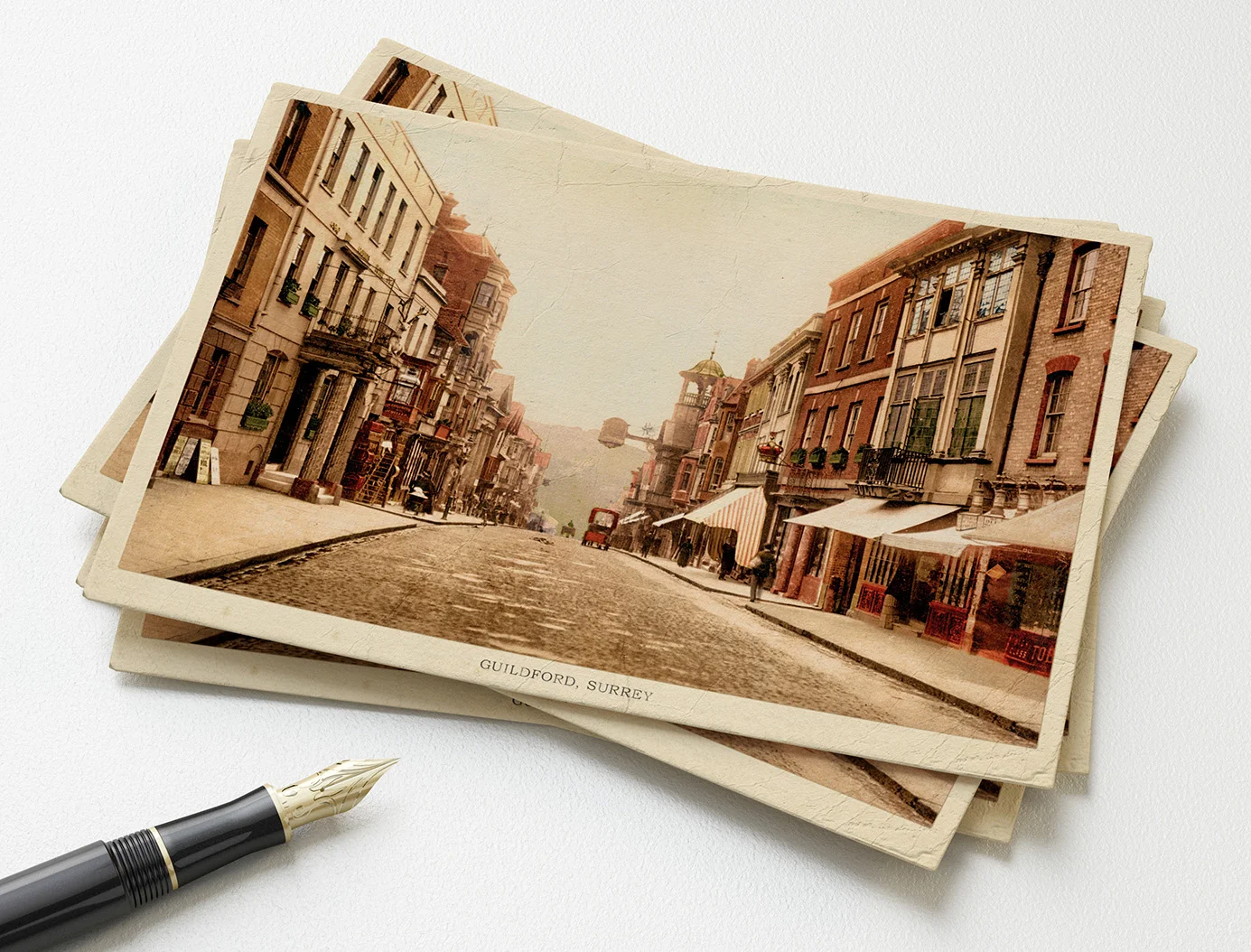 Hand-written and crafted postcards featuring a genuine historical photo and story from the recipient's home town. 
