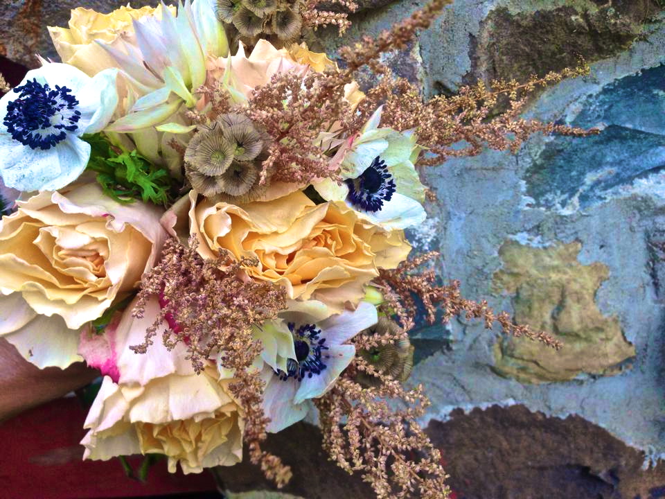 Elegant wedding bouquet focusing on small hills of texture. What's the number one flower in this arrangement? We LOVE anemones! Being a New York City florist, we love throwing in aspects that look very nature-esqu. This reminds us that there is life outside of NYC!
