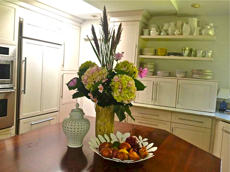 Gorgeous Hydrangea flower arrangement adds a pop of color to this spacious New York City apartment.