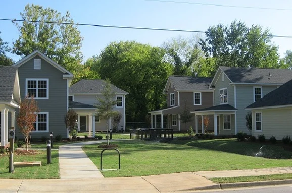 Randolph Commons in the Southernside neighborhood is a six unit affordable rental pocket community. Constructed in a cluster and using innovative new urban design principles, the development makes maximum use of a neglected 7/10 acre former trash dump.