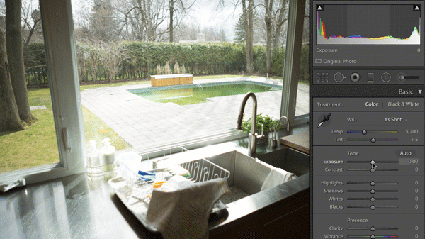 Reducing exposure on this raw file in Lightroom reveals a blue sky where the default settings were clipped to white.