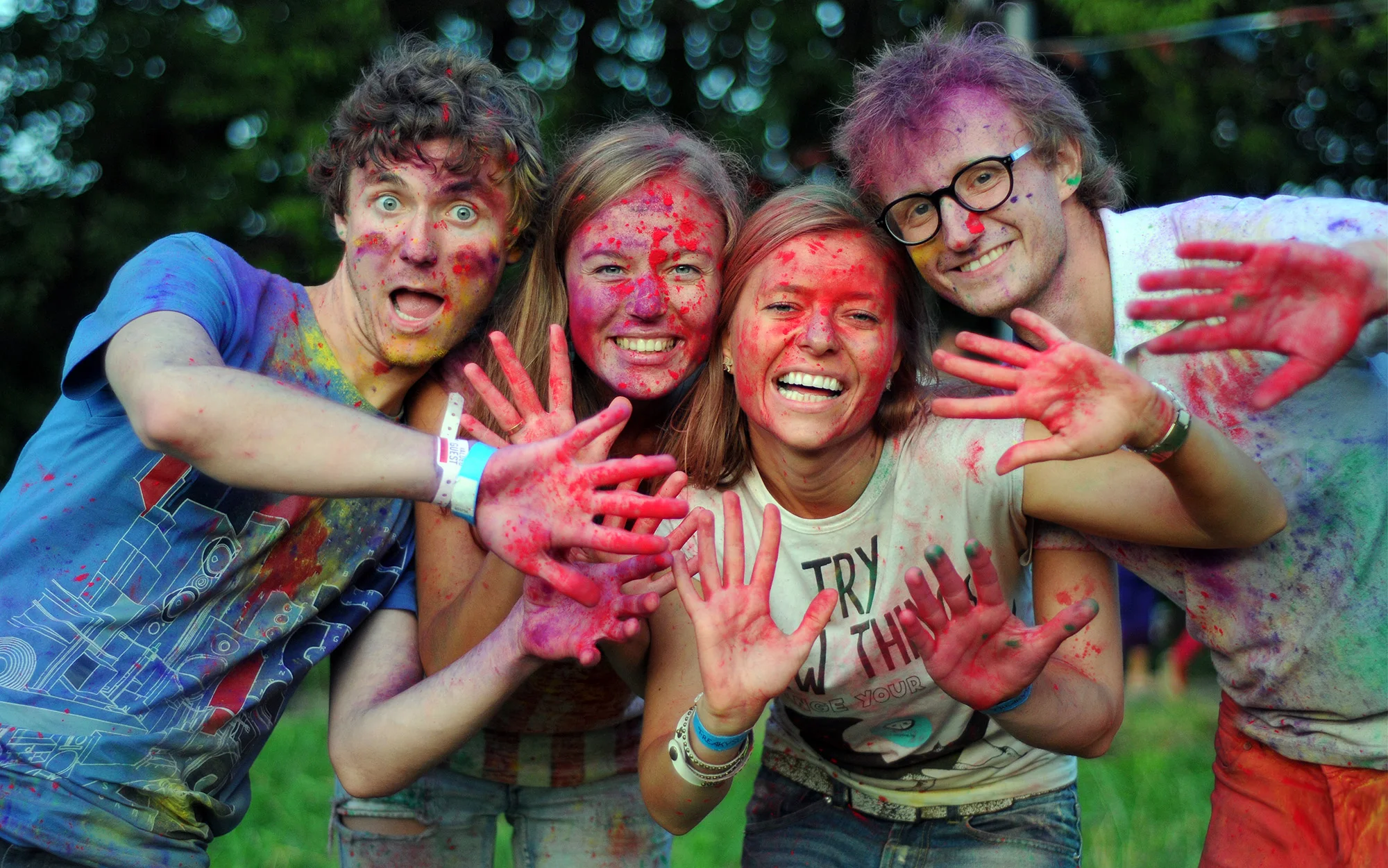  People having fun with holi colored powder on one of the summer festival  "   FSP "  in Minsk 