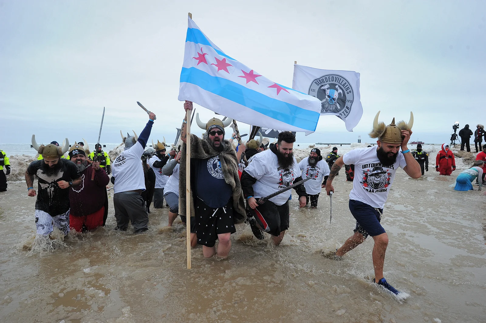  Participants flee the frigid water during the 19th annual Chicago Polar Plunge on March 3, 2019, at North Avenue Beach. The money raised from the event goes to all of the items that the Special Olympics organization needs for more than 7,500 area at