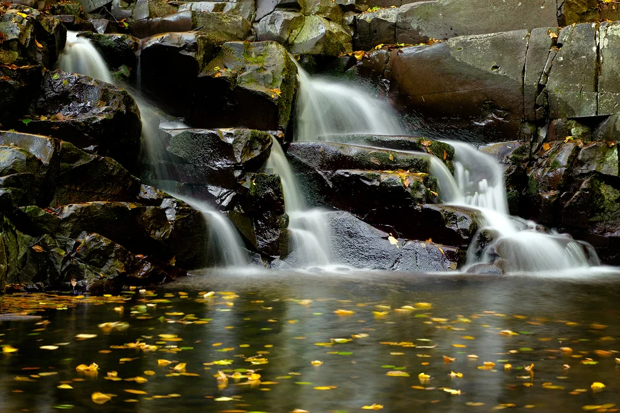 bigstock-Little-waterfall-with-colorful-37776865.jpg