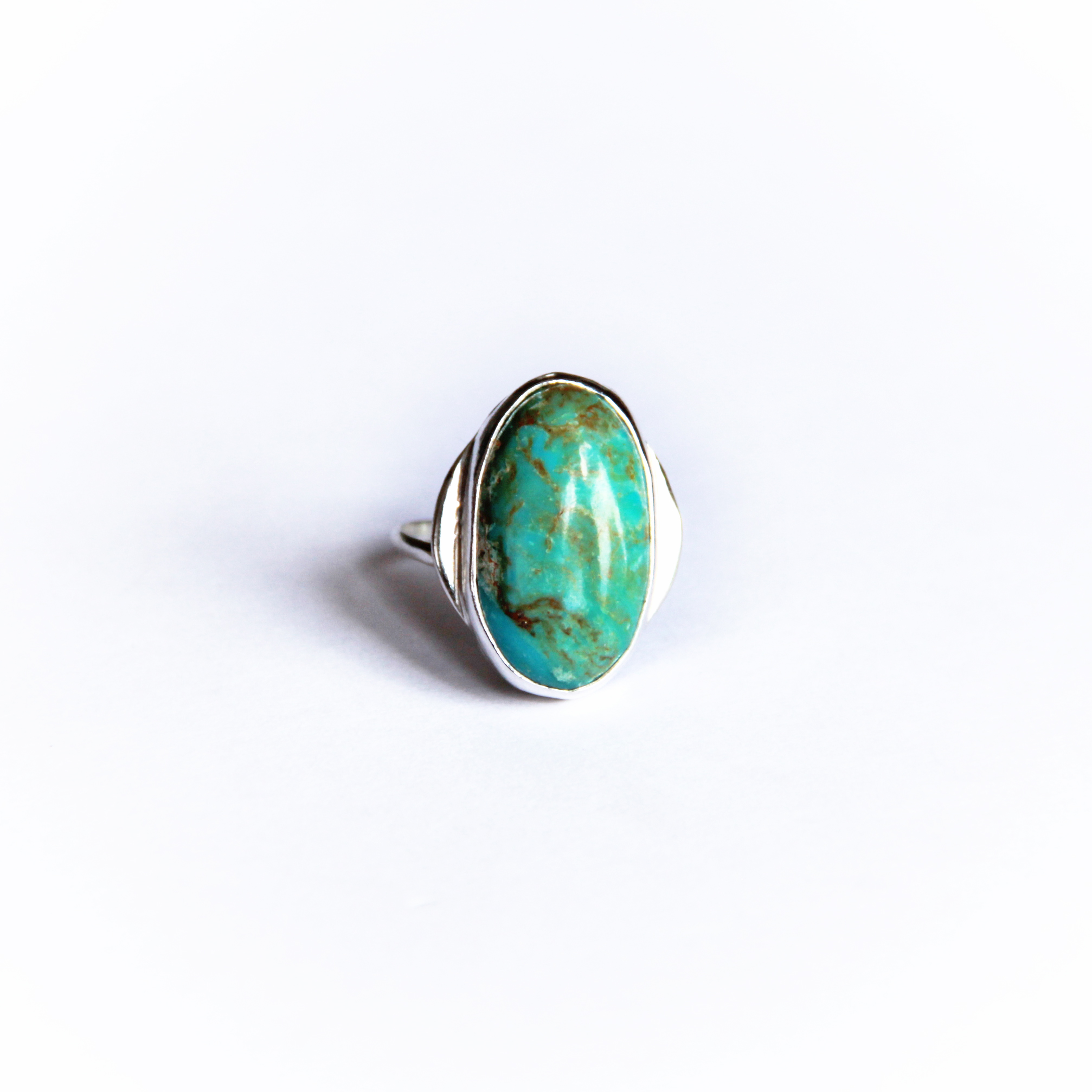 TURQUOISE AND STERLING SILVER. SIZE 7. DAY ONE RING.