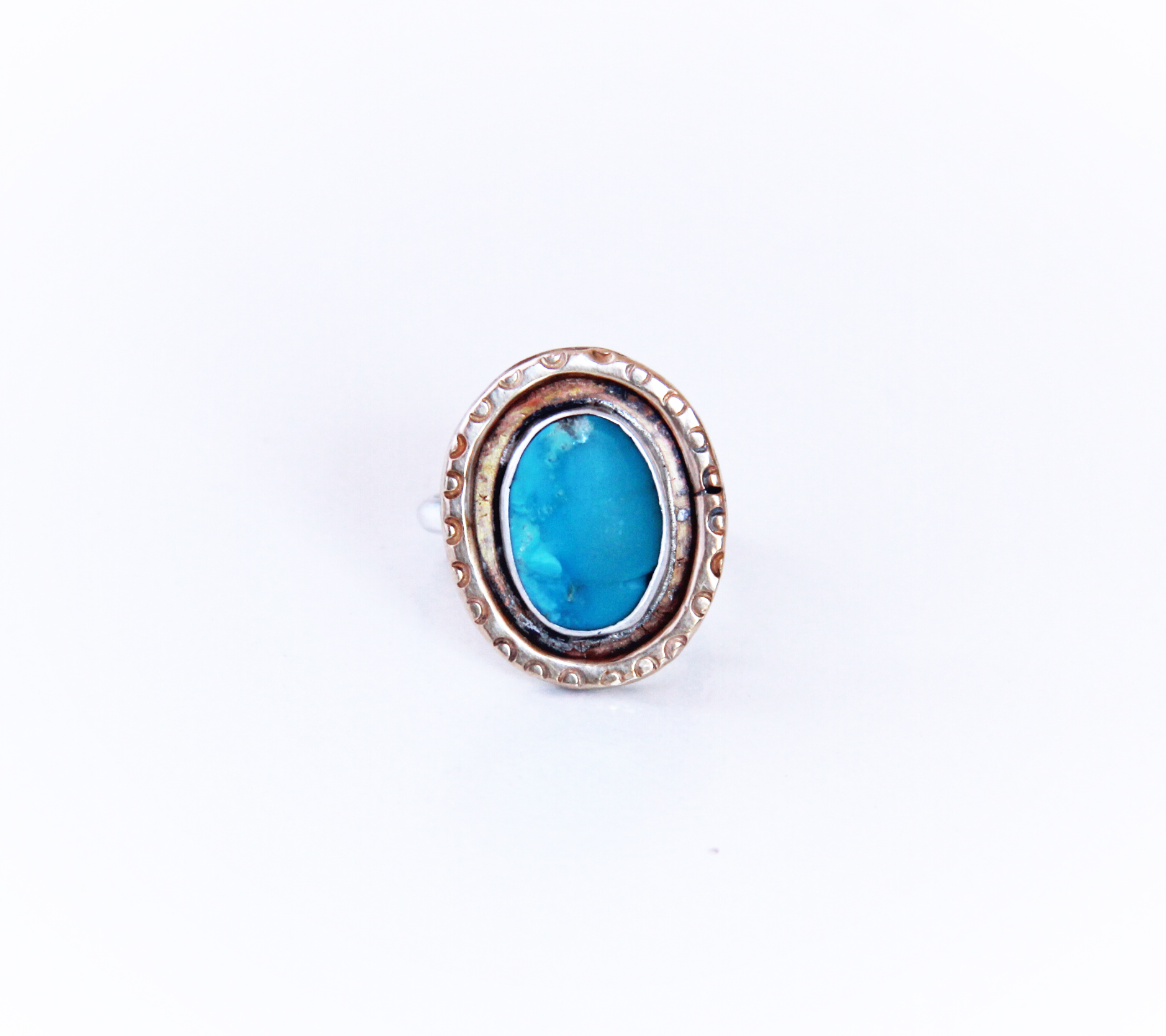 TURQUOISE. BRASS. STERLING SILVER RING. SIZE 8