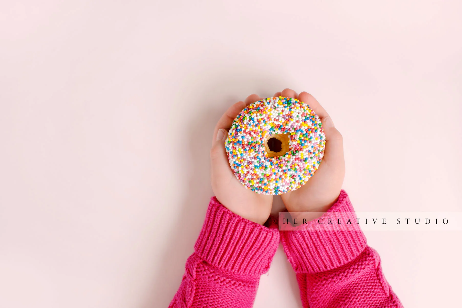 Girl-holding-donut-IE.jpg
