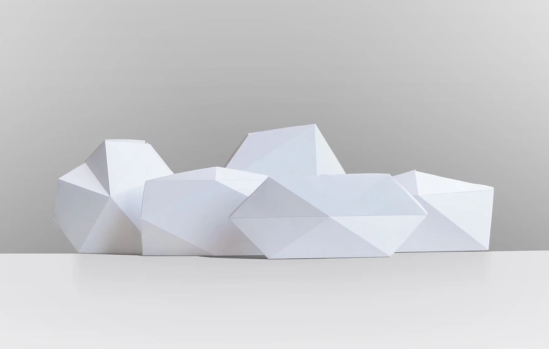 Pure in its form, pleats paper models represent the genesis of our Linea Collection . 