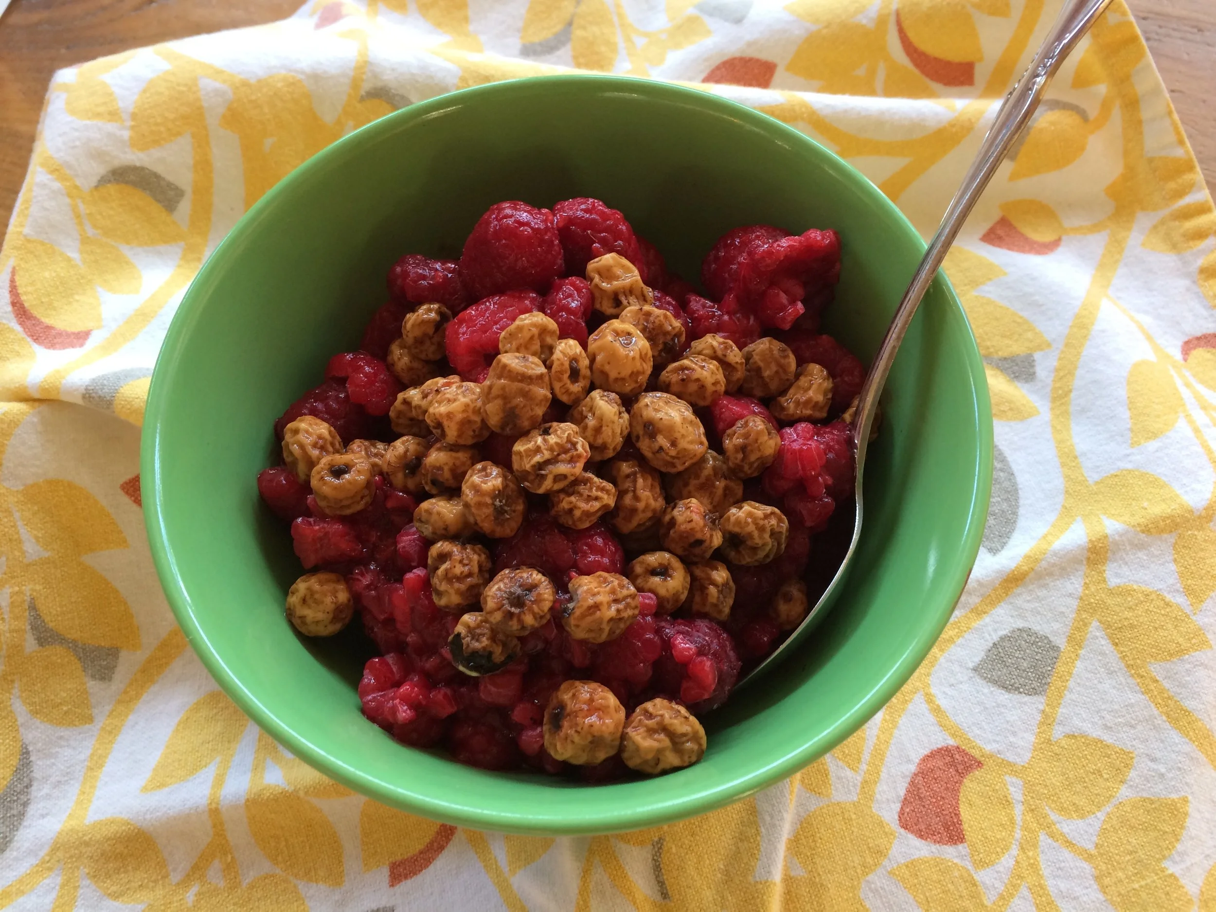 Soaked Tigernuts over raspberries.