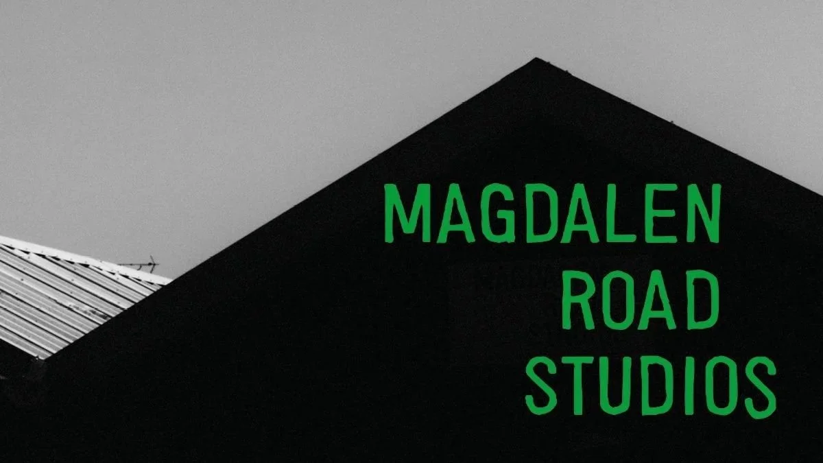 "Magdalen Road Studios" in green on greyscale silhouette of the main studio building