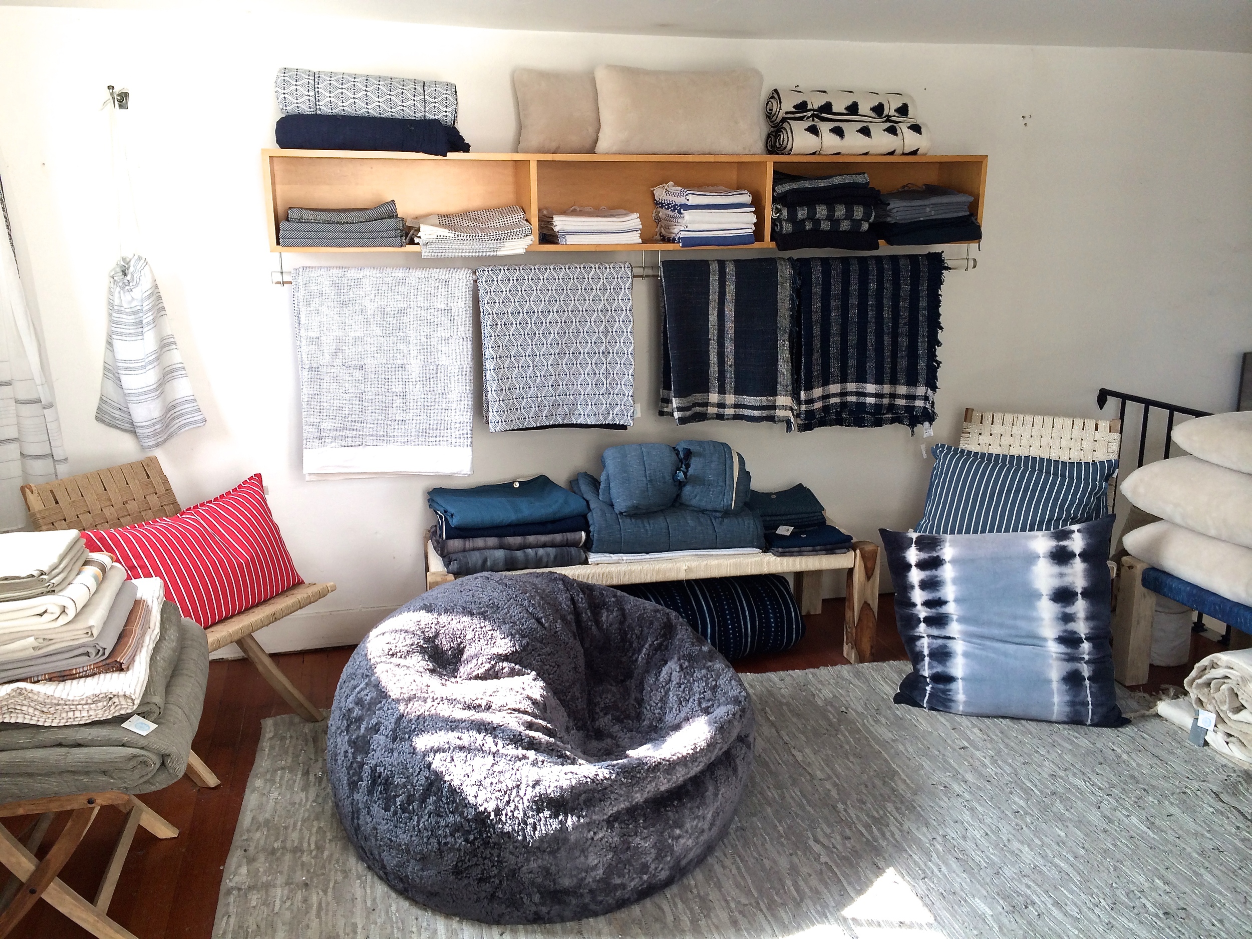 Pillows, blankets and other home fabrics in the upstairs loft.