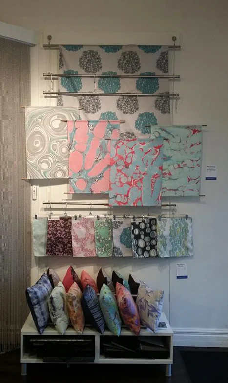 Prillamena's display for the Art Walk. We featured our fabric, pillows, and wallhangings