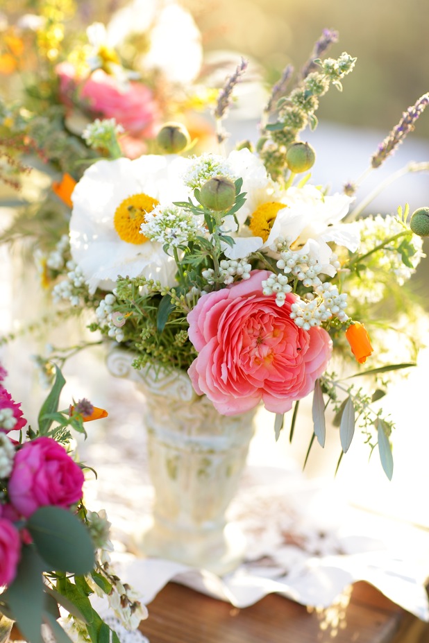 Arrangement full of Poppies and Garden Roses