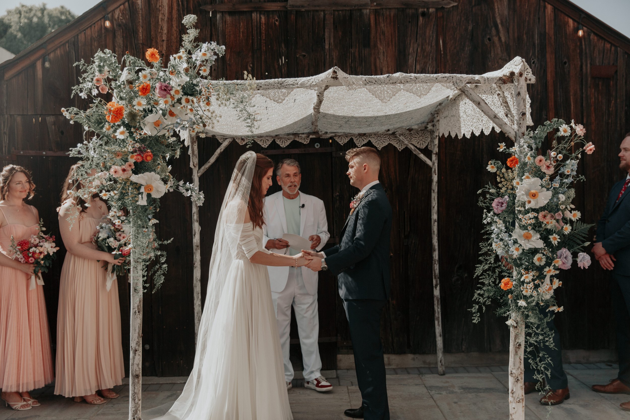 WildflowerChuppahwithcouple.jpg