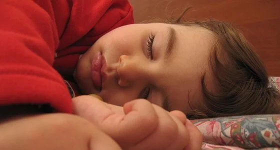 560px-A_child_sleeping,_Alessandro_Zangrilli.jpg
