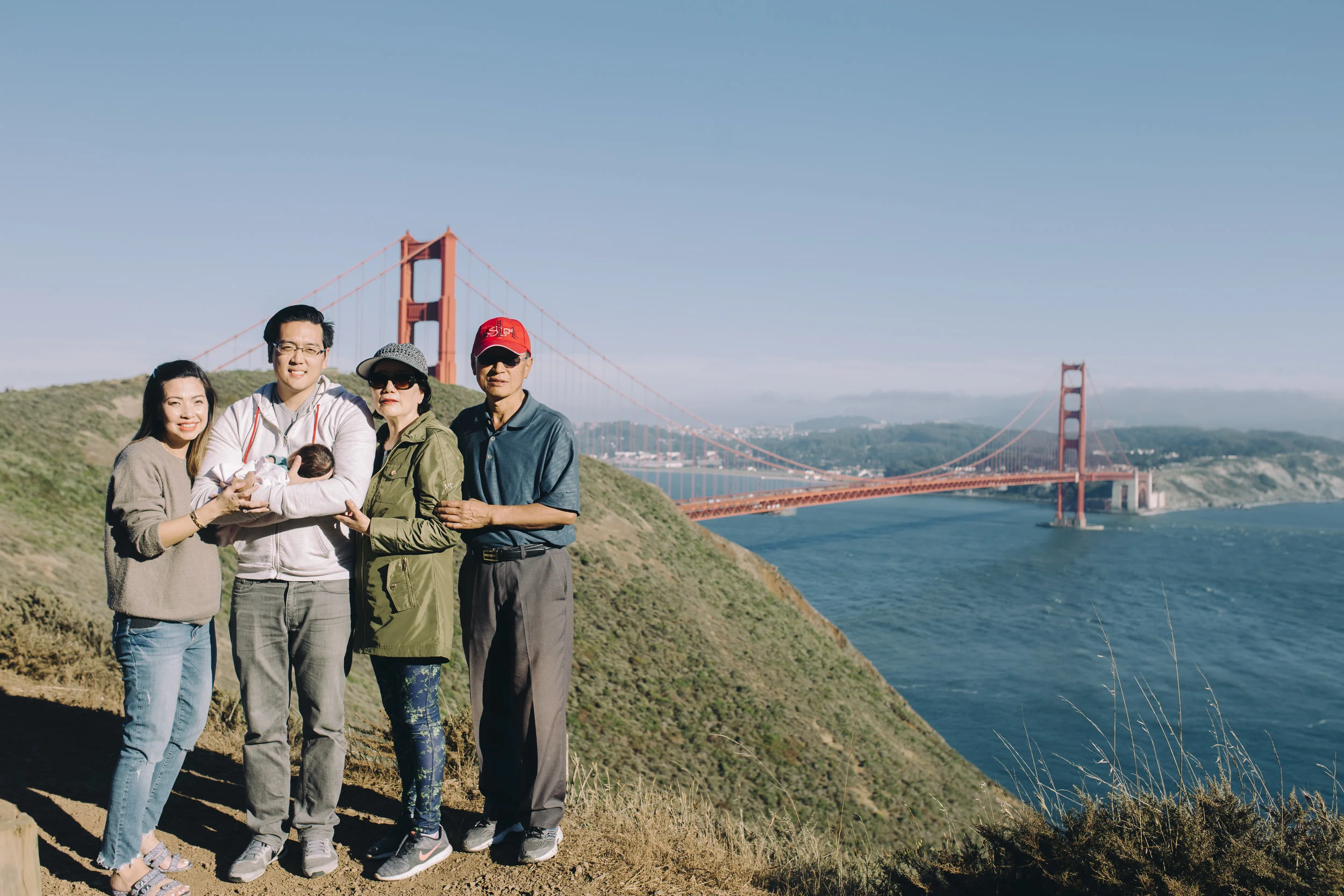 Our American - Canadian girl celebrating her one month birthday with her Grandparents at the iconic Golden Gate Bridge.