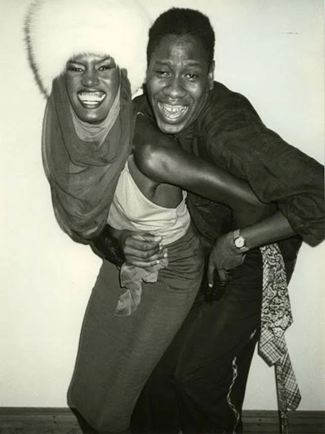 With Grace Jones via Whowhatwear.