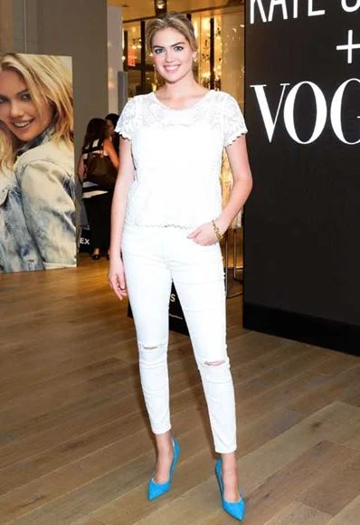 Kate Upton in mid-rise, narrow-leg white jeans; image via Pinterest.