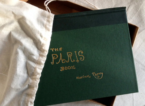 THE PARIS BOOK LIMITED EDITION. The Paris Book by Marian Parry (Un-Gyve Press, Boston) limited edition of 333 signed and numbered by the artist; a hand-bound, cloth-covered book in gold-stamped box and cotton satchel with twenty carefully reproduced watercolours. ( PRNewsFoto/Un-Gyve Press )