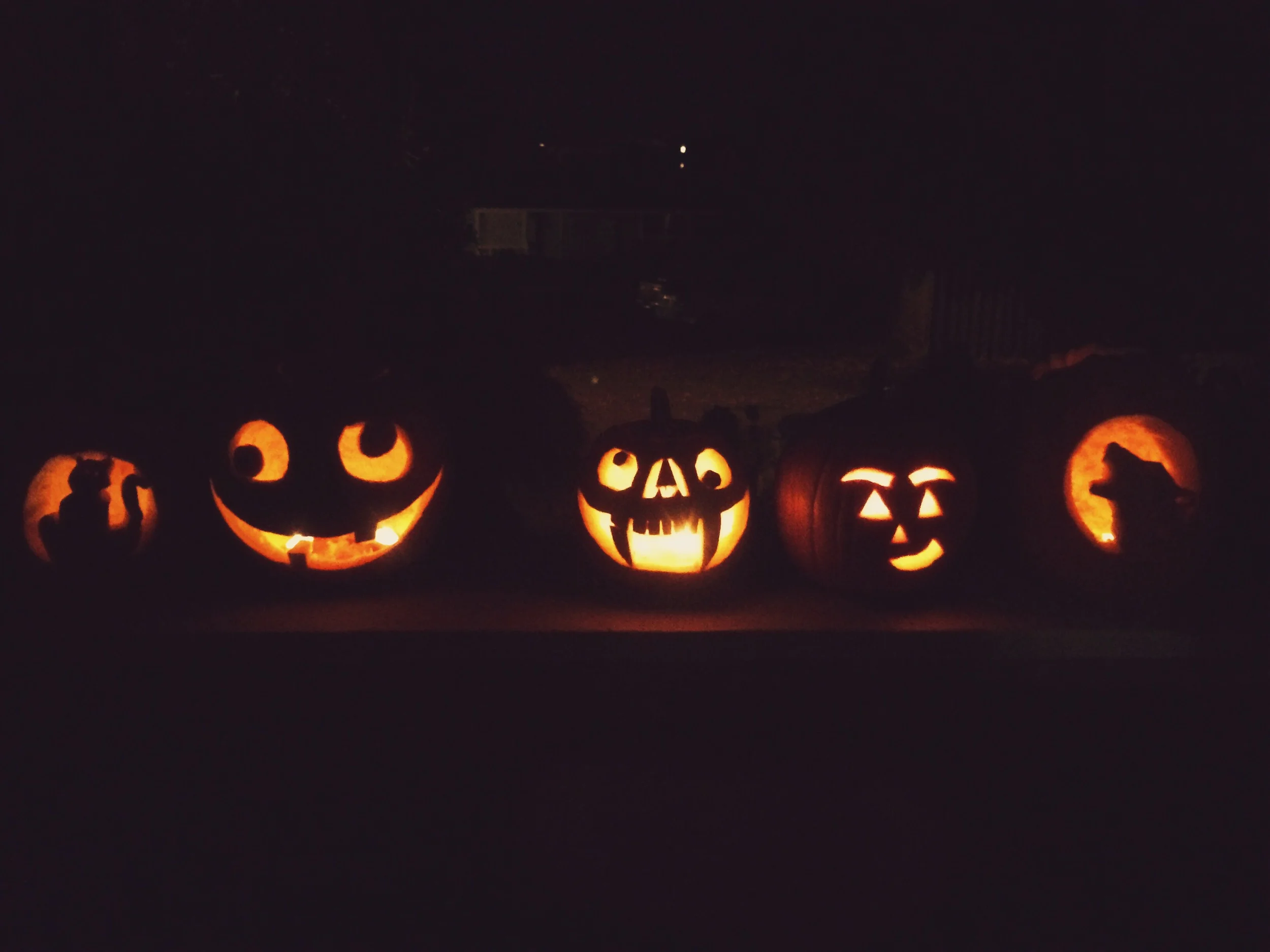Some of the pumpkins from Jaz's carving party!