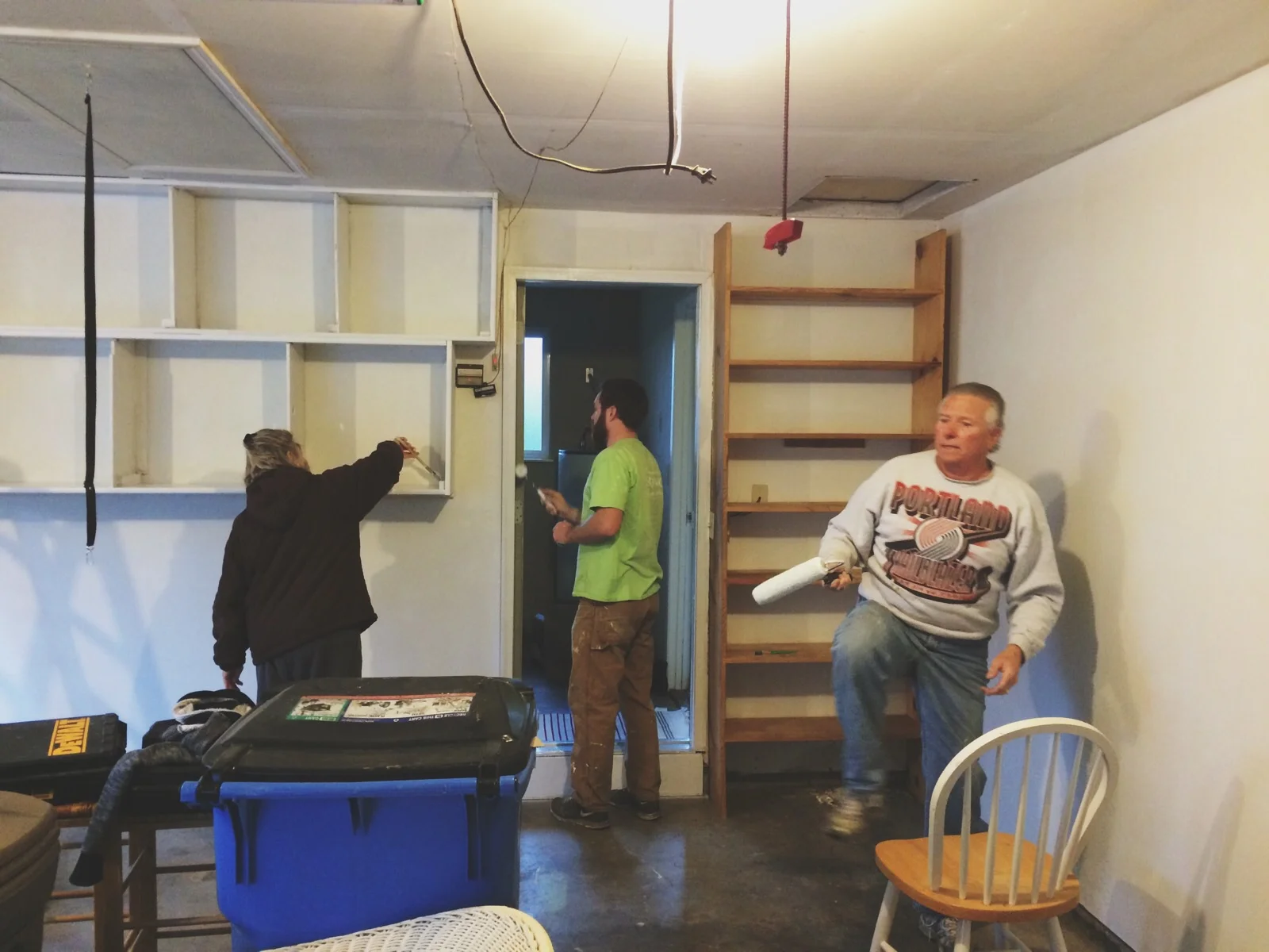 Mama J, Marsh, and Papa B painting the new garage