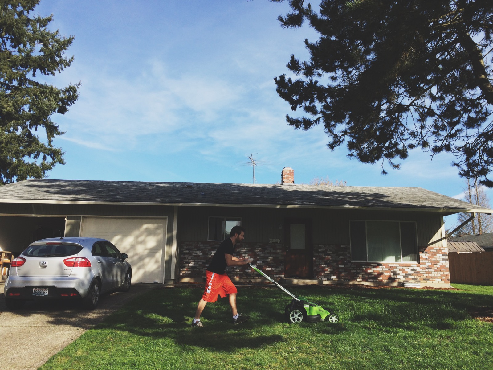 Marsh mowing the lawn for the first time.