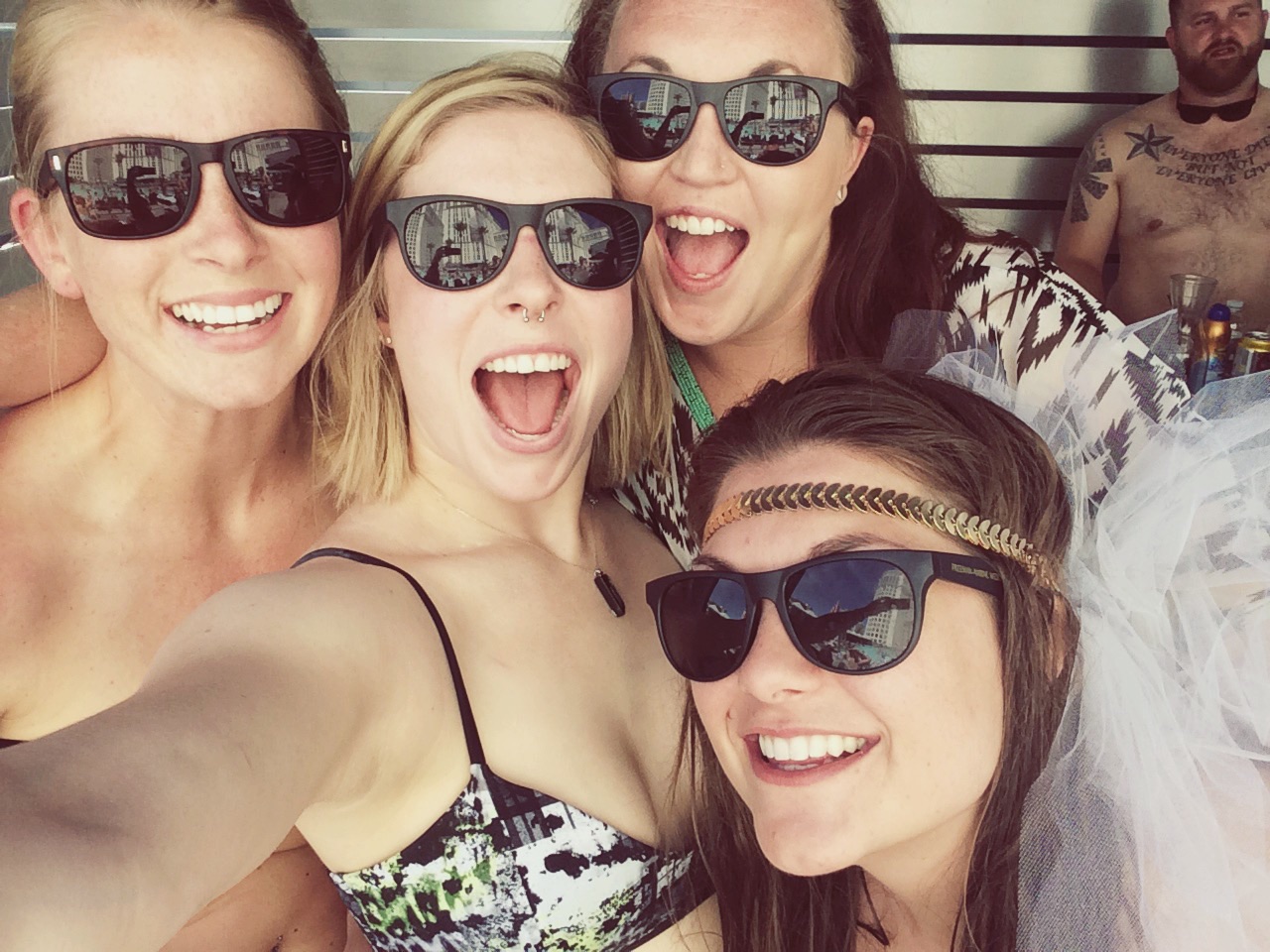 The girls greeting me with some smiles and booze at Planet Hollywood's pool party