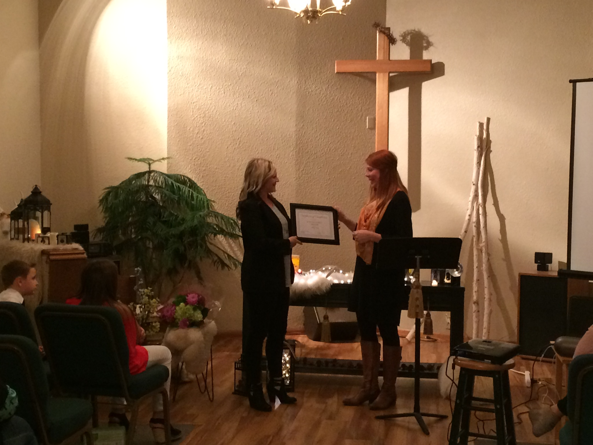  The CAC's most recent graduate of the Healing Home Program receiving her diploma on October 3. 