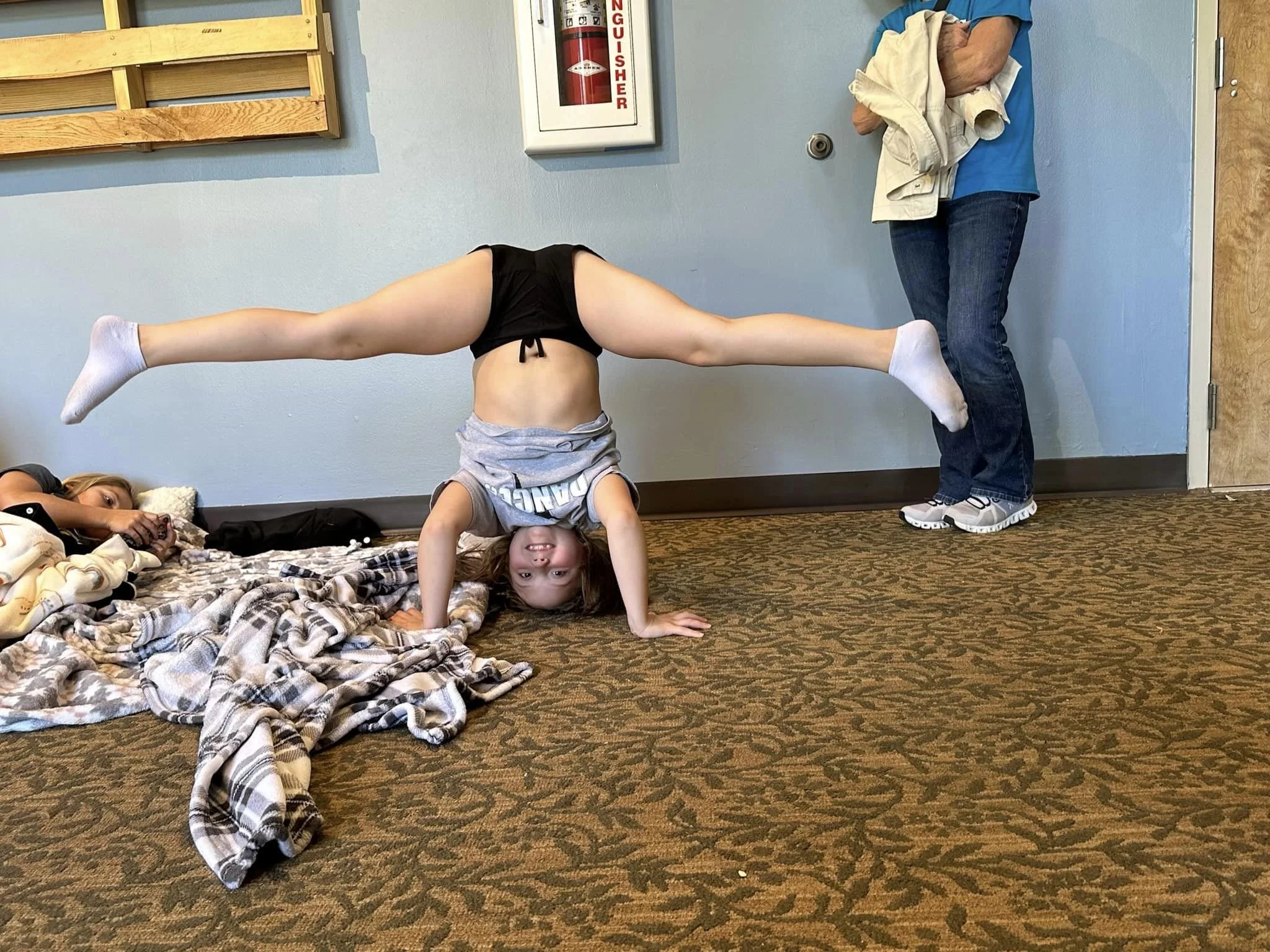 maddie straddle headstand.jpeg