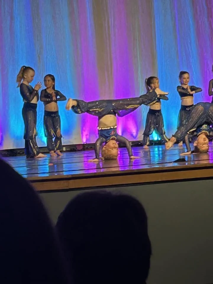 Addison straddle headstand.jpeg