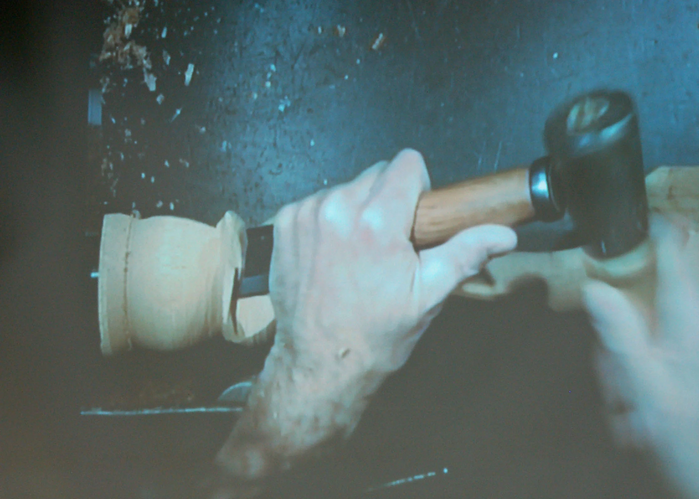 Mark does a little shoulder shaping with a chisel and mallet.