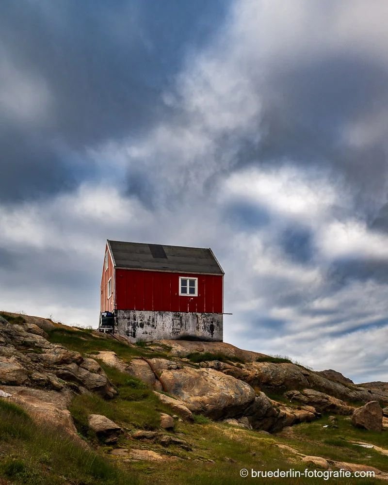 #eastgreenland #greenland #colorpower #village #tasiilaqgreenland #tasiilaq #cloudpower #house #rockformation #redhouse #redcolor #landscape
