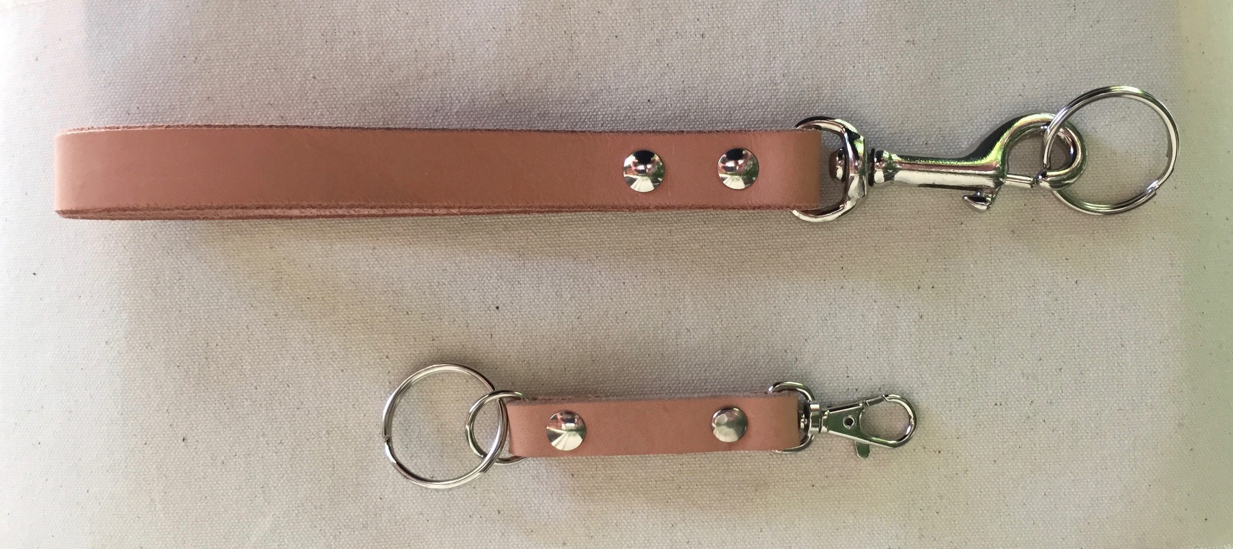 Leather keystraps come in 2 sizes. 