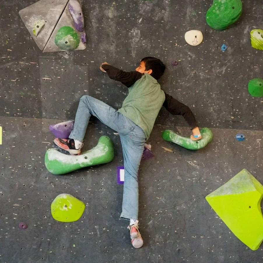 Teen climber participating in Crux League at Shasta Rock Club