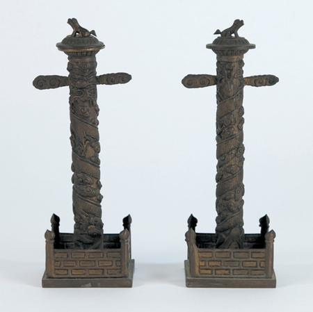 PAIR-OF-QING-DYNASTY-BRONZE-CANDLE-STANDS-.png